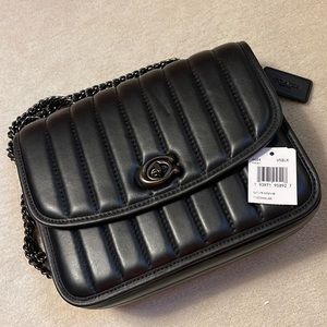 Brand new, never used Madison shoulder bag with quilting in black